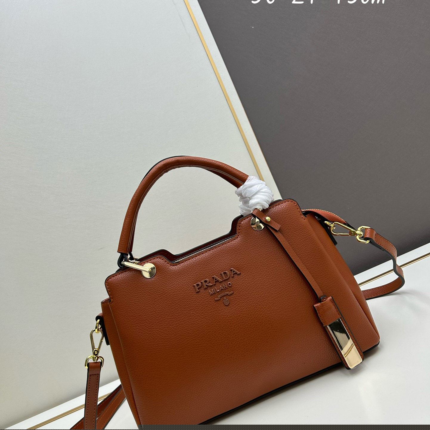 Pra*a top handle bags